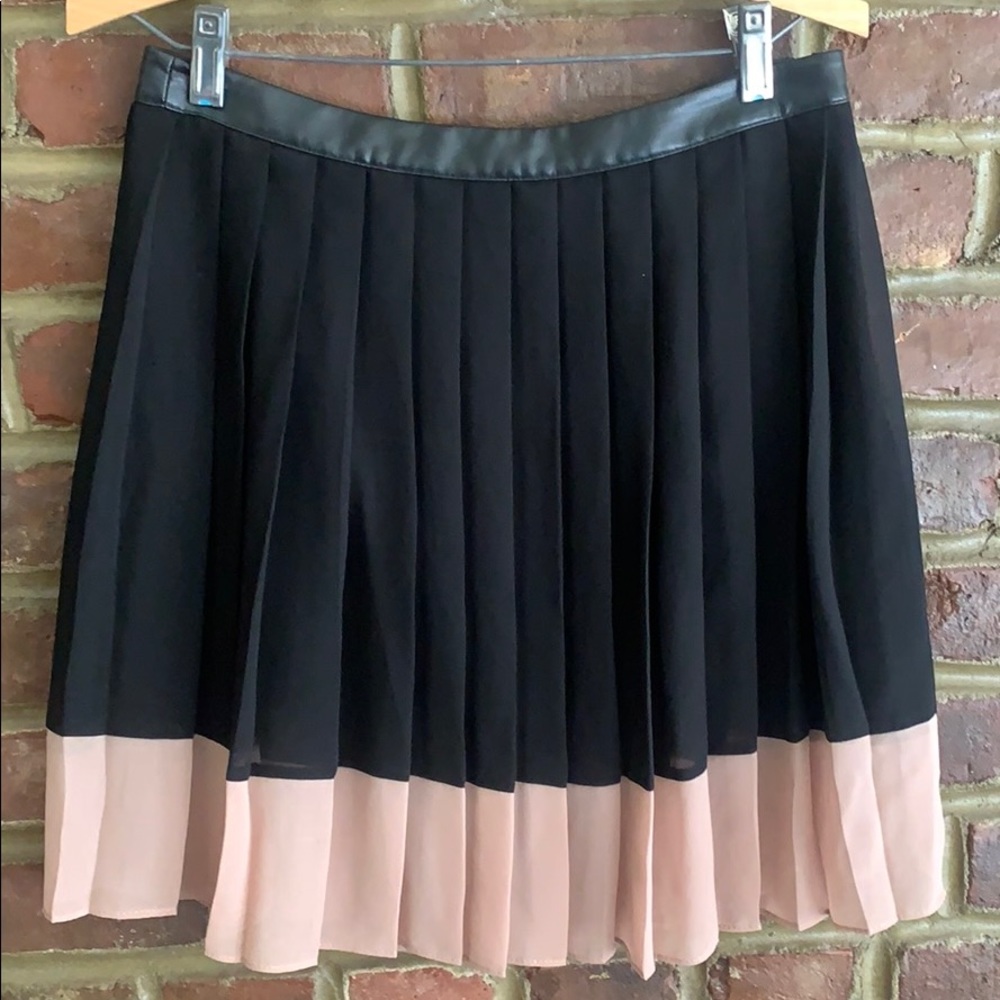 Color blocked pleated skirt with leather trim